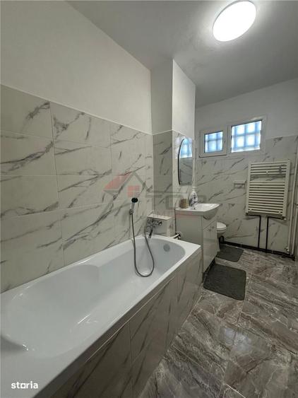 Apartament cu 2 camere semidecomandat în Podu Roș