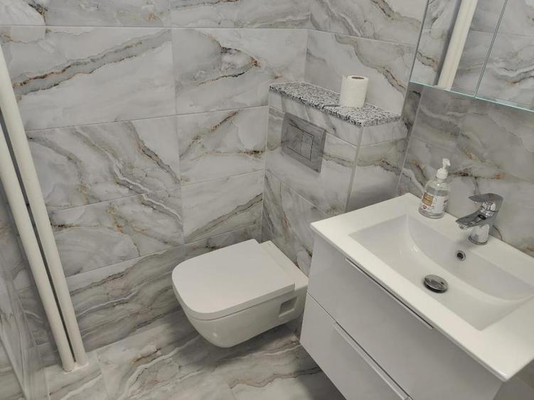 Apartament cu 3 camere în Baba Novac