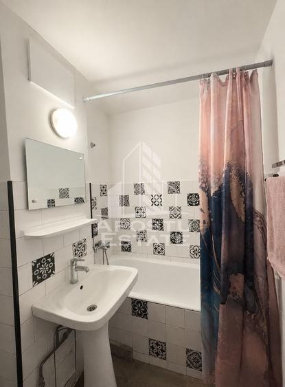 Apartament cu 2 camere semidecomandat, mobilat în Dâmbovița