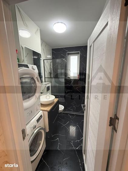Apartament cu 2 camere semidecomandat în Chinteni