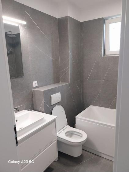 Apartament cu 3 camere decomandat în Petecu