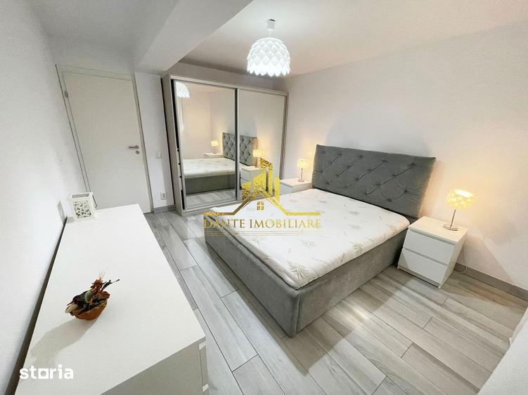 Apartament cu 2 camere semidecomandat, mobilat în Borhanci