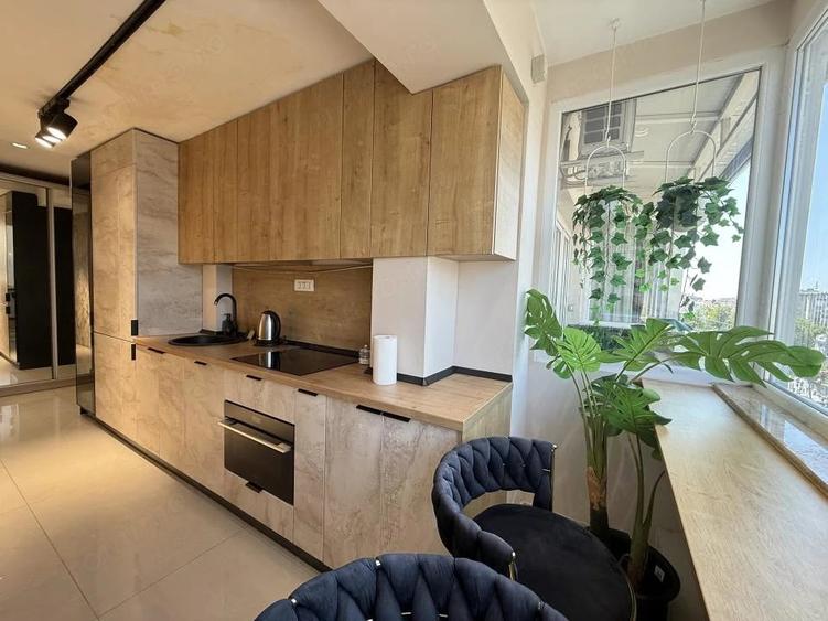 Unicat in Pia?a Romana! 2 camere, 53 mp, renovat integral cu designer - 8