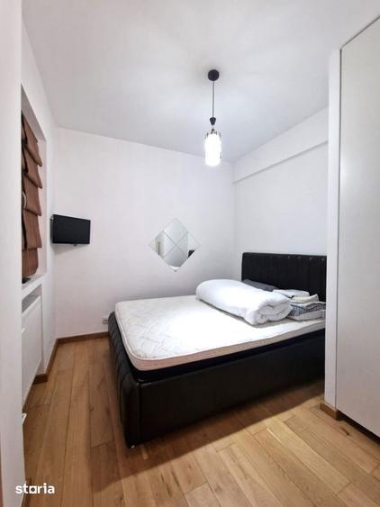 Apartament cu 3 camere în Romană