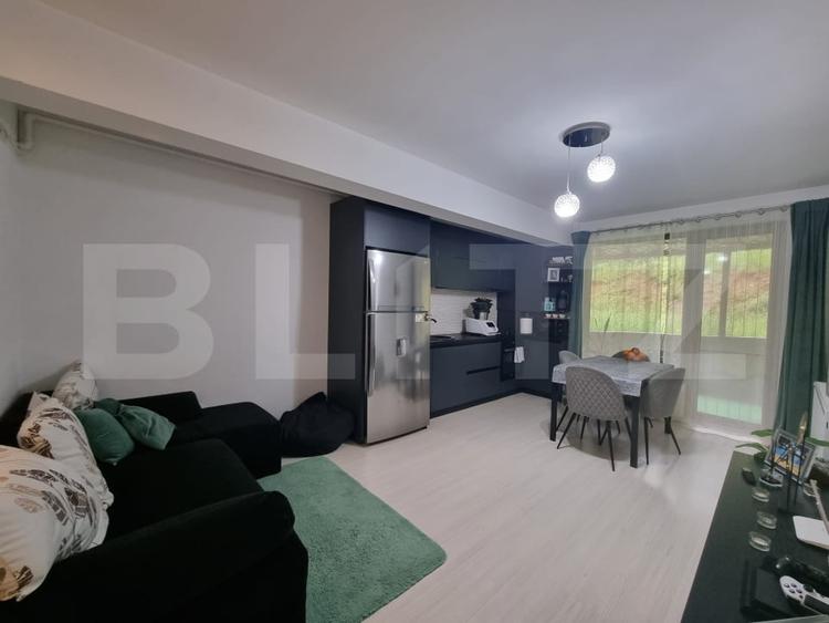 Apartament cu 2 camere semidecomandat, mobilat în Baciu