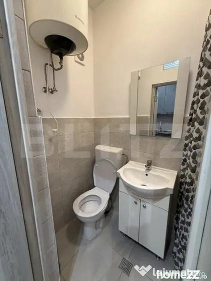 Garsonieră decomandată în Central