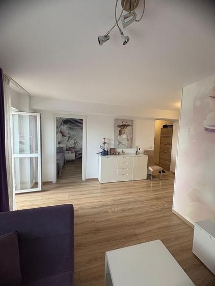 Apartament cu 2 camere semidecomandat în Cățelu