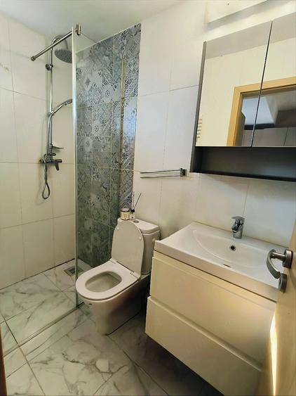 Apartament cu 3 camere semidecomandat în Central