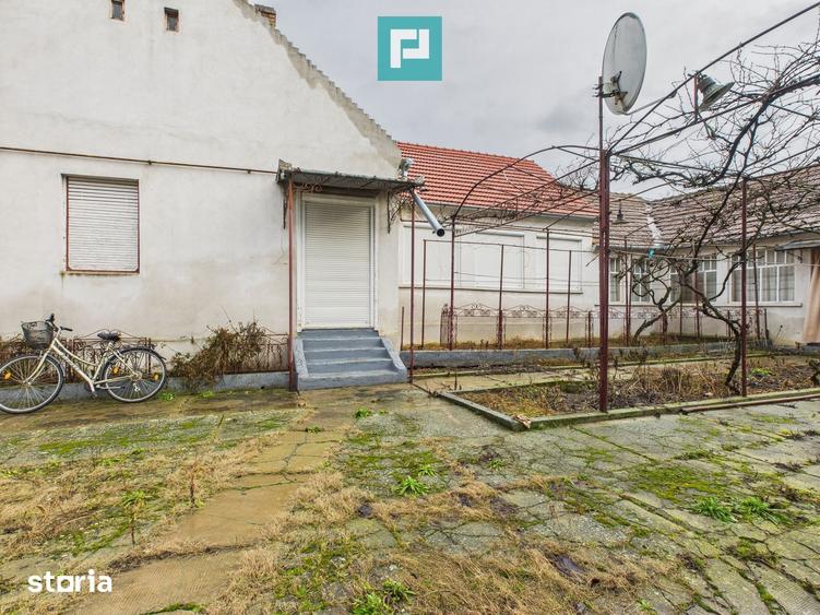 Casă cu 4 camere cu Teren 1473 Mp în Central