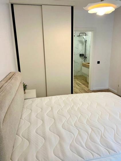 Apartament cu 2 camere semidecomandat, mobilat în Florești — fotografia 3
