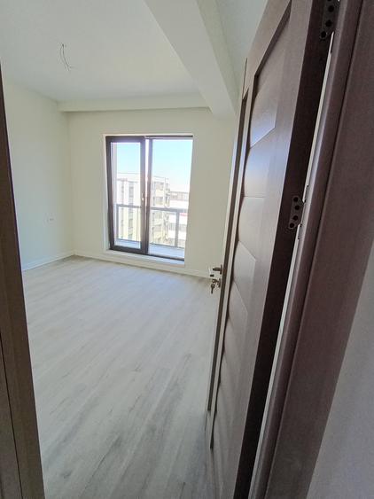 Exclusiv - Apartamente finalizate 2 camere și 3 camere -Loc parcare - 18