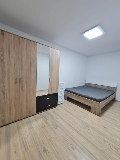Apartament cu 2 camere semidecomandat, mobilat în