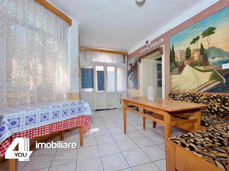 Casă cu 4 camere cu Teren 1459 Mp în Secusigiu