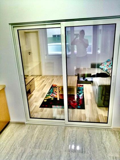 Apartament cu 2 camere semidecomandat, mobilat în Central