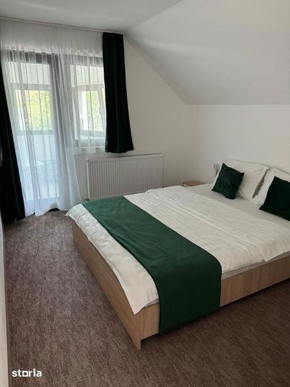 Casă cu 9 camere cu Teren 500 Mp în Sânmartin