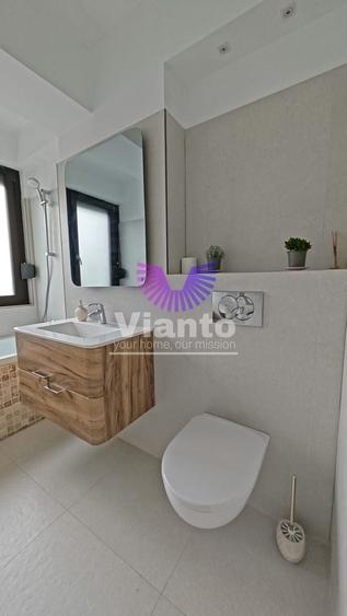 Apartament cu 2 camere semidecomandat, mobilat în Central