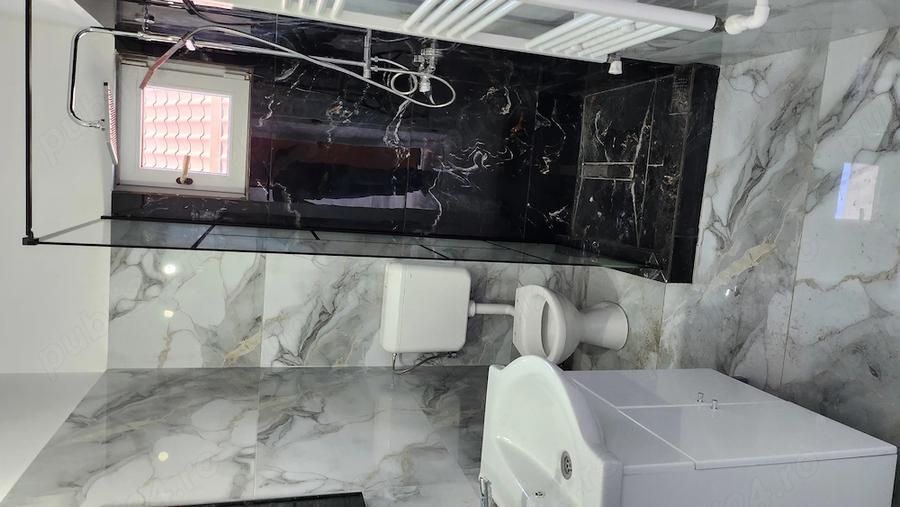 Apartament cu 4 camere semidecomandat în Central