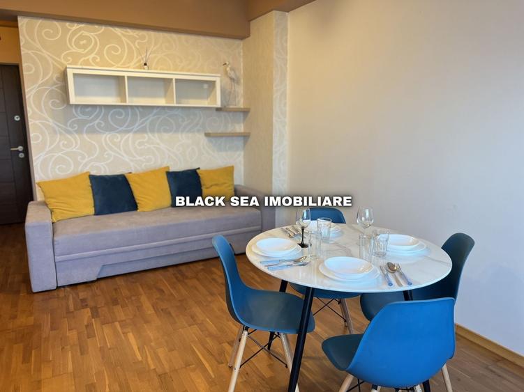 Apartament cu 2 camere semidecomandat, mobilat în Central