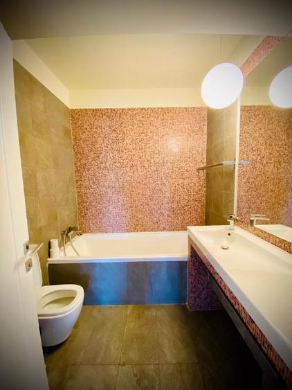 Apartament cu 2 camere semidecomandat, mobilat în Central