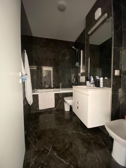 Apartament cu 2 camere semidecomandat în Chinteni