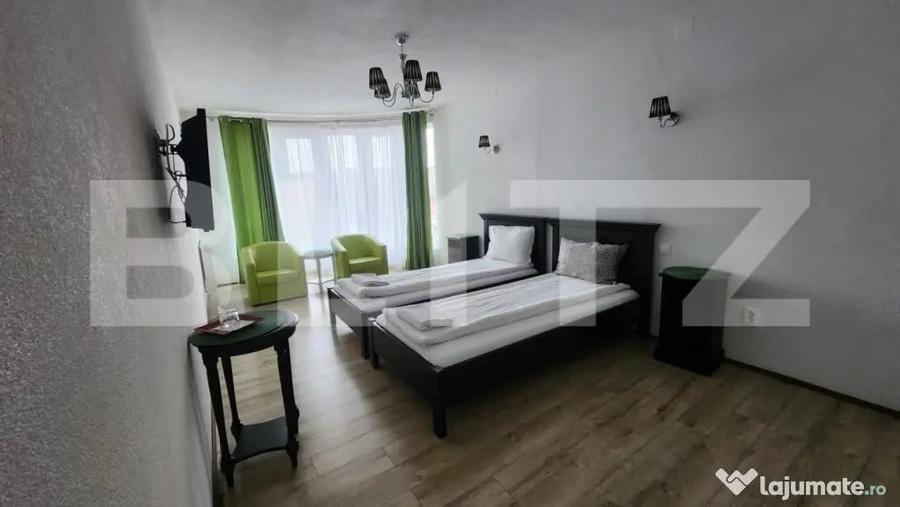 Casă cu 10 camere cu Teren 1100 Mp în Corunca