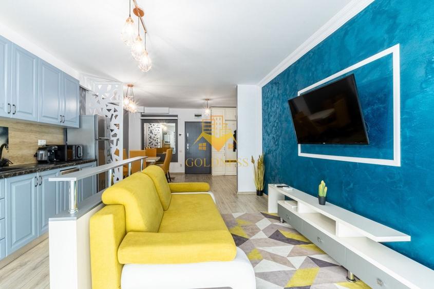 Apartament cu 2 camere semidecomandat, mobilat în Central