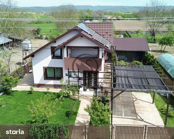 Casă cu 5 camere cu Teren 1073 Mp în Podenii Noi