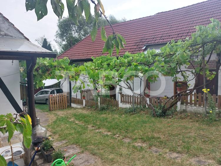Casă individuală cu 6 camere cu Canalizare în Cisnădioara