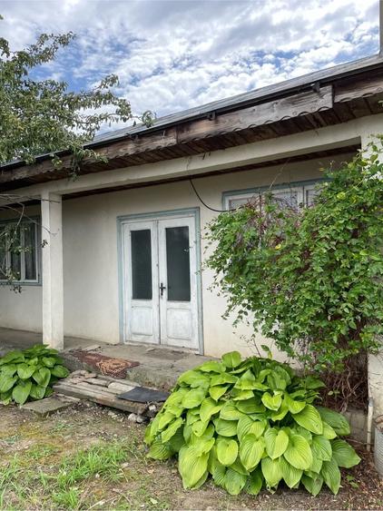 Casă cu Teren 970 Mp în Central