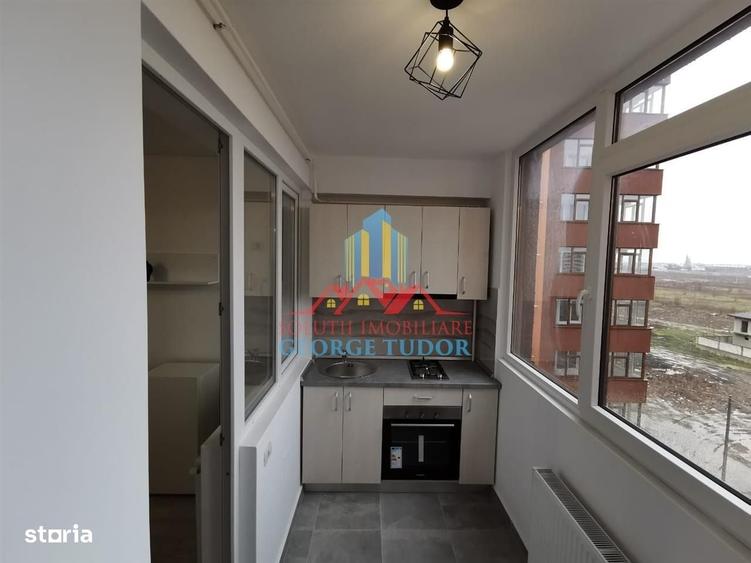 Apartament cu 2 camere decomandat în Roșu — fotografia 2