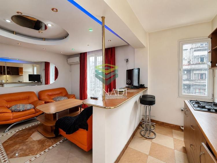 Apartament cu 3 camere semidecomandat în Cișmigiu