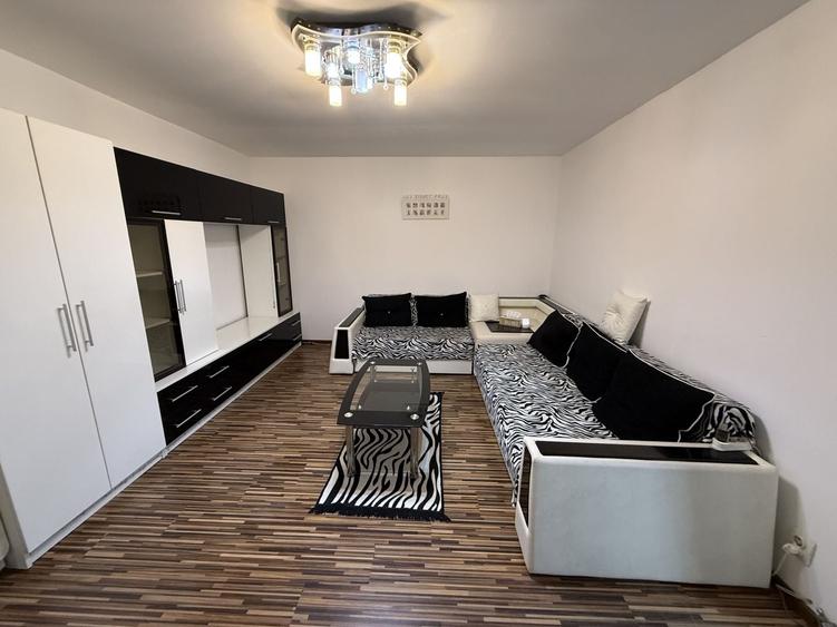 Apartament cu 2 camere semidecomandat, mobilat în Central