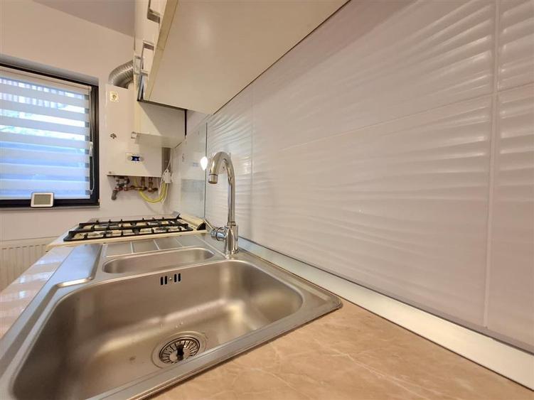 Apartament cu 2 camere semidecomandat, mobilat în Bucium