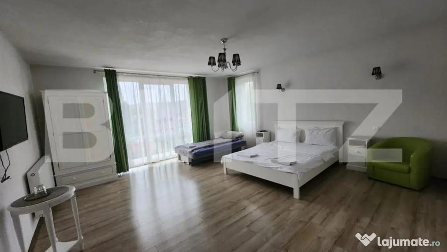 Casă cu 10 camere cu Teren 1100 Mp în Corunca
