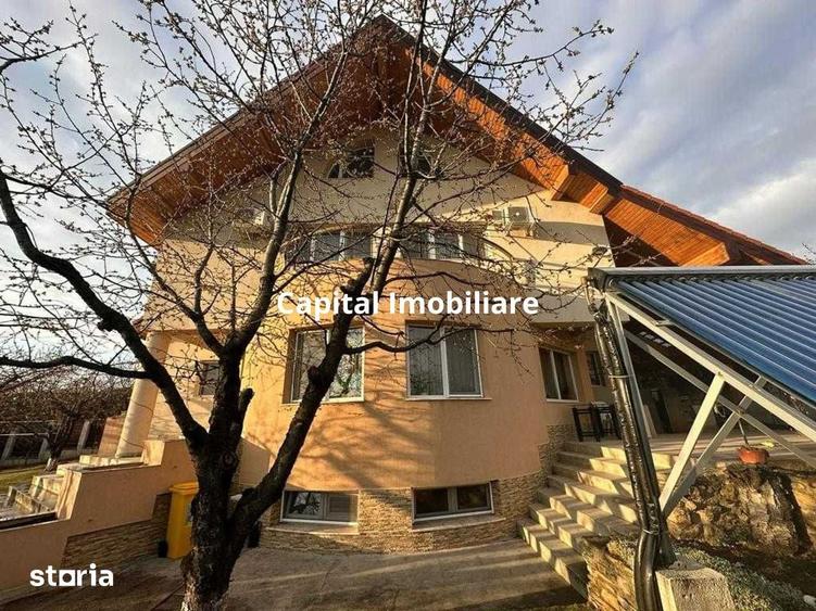 Casă cu 7 camere cu Teren 1200 Mp în Tomești