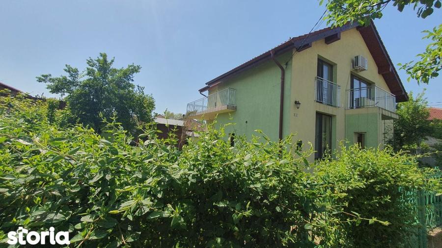 Casă cu 5 camere cu Teren 500 Mp în Ronaț