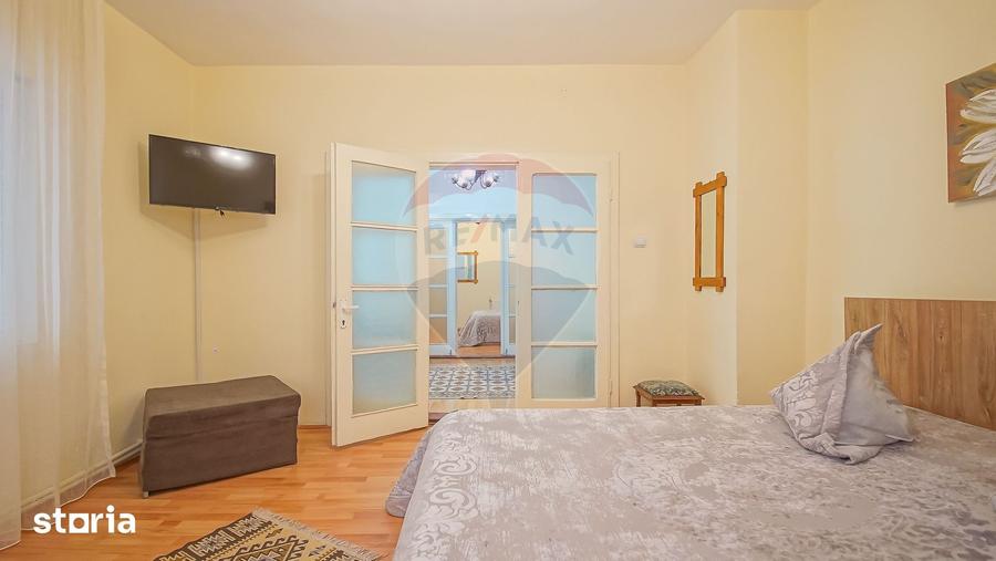 Casă cu 8 camere cu Teren 485 Mp în Central