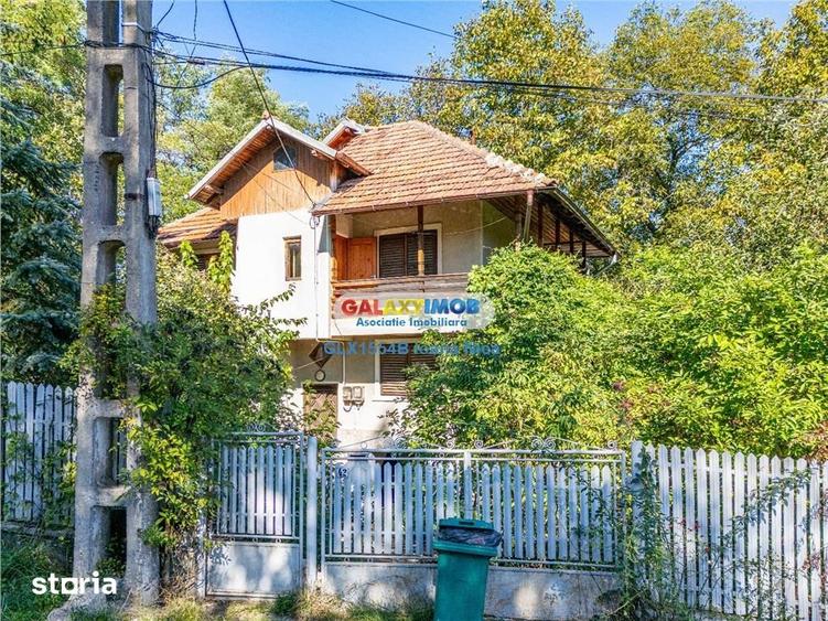 Casă cu 7 camere cu Teren 1000 Mp în Central
