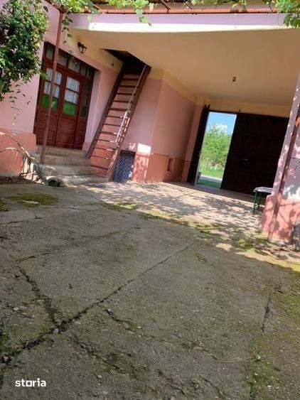 Casă cu 4 camere cu Teren 90 Mp în Pomezeu