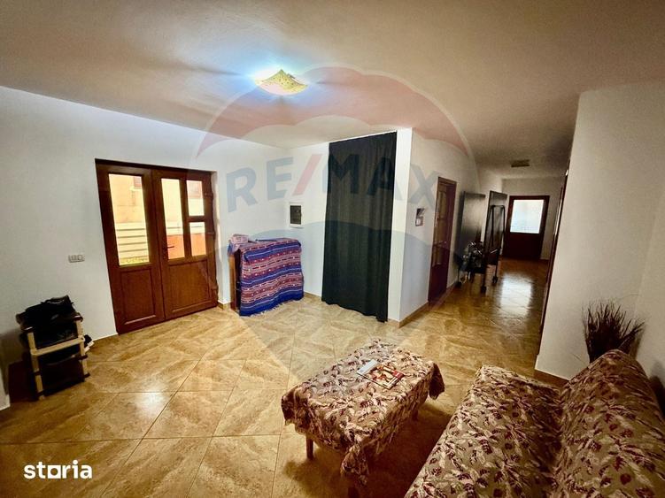 Casă cu 4 camere cu Teren 873 Mp în Vânători