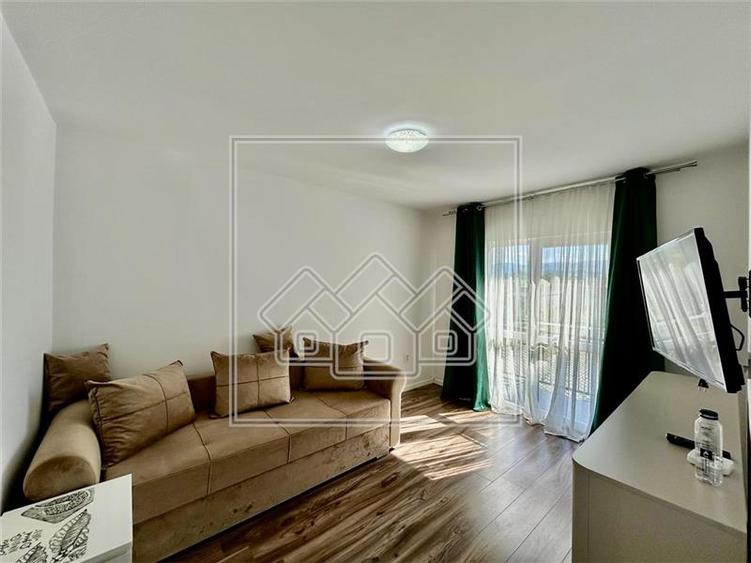 Apartament cu 2 camere, decomandat + balcon, 2 locuri de parcare - 2
