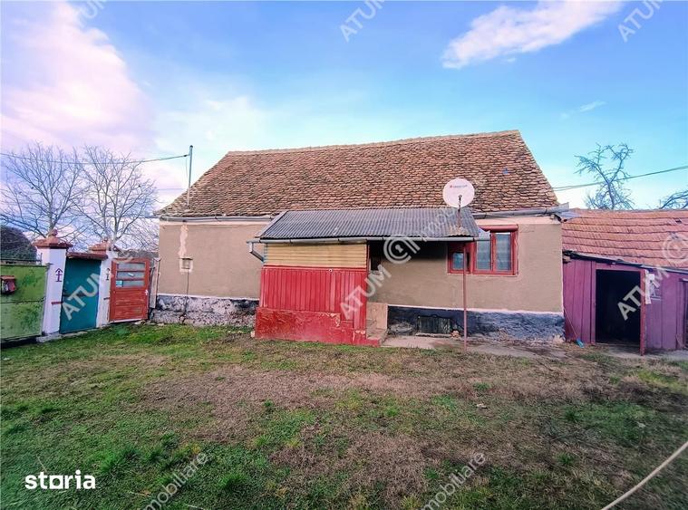 Casă cu 4 camere decomandat cu Teren 1650 Mp în Porumbacu de Jos
