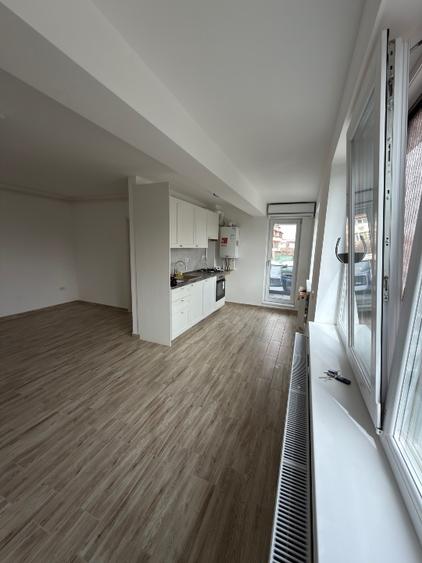 Apartament cu 2 camere semidecomandat, mobilat în Central