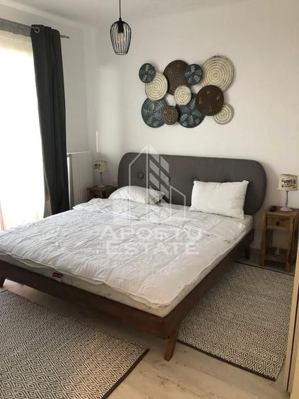 Apartament cu 2 camere semidecomandat, mobilat în Torontalului