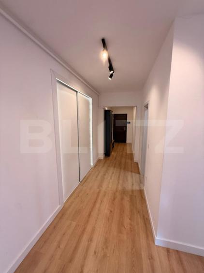 Apartament cu 2 camere ,etaj 1, 70mp util , balcon 12mp, Bar - 6