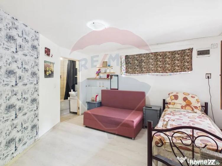 Casă cu 9 camere cu Teren 341 Mp în Dâmbovicioara