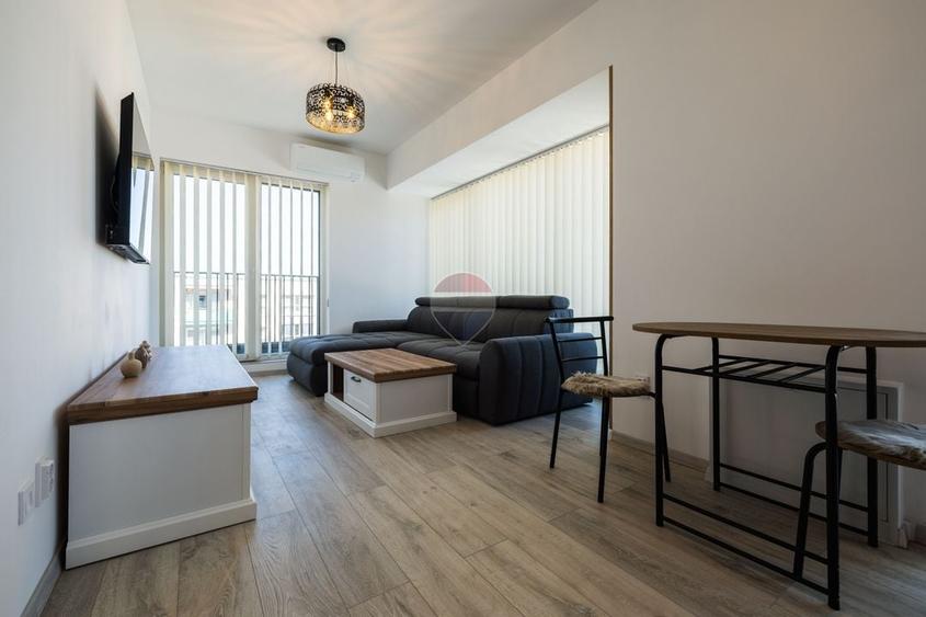 Apartament cu 2 camere decomandat, mobilat în Tractorul