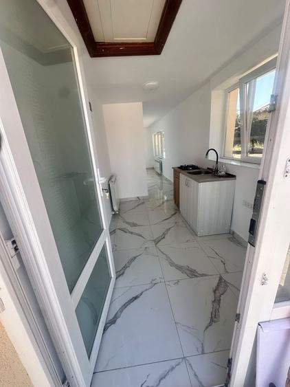 Casă individuală cu 4 camere cu Canalizare în Corbu