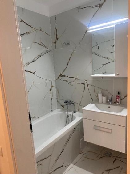 Apartament cu 2 camere semidecomandat, mobilat în Central