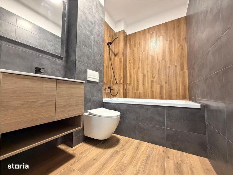 Apartament cu 3 camere decomandat în Tractorul